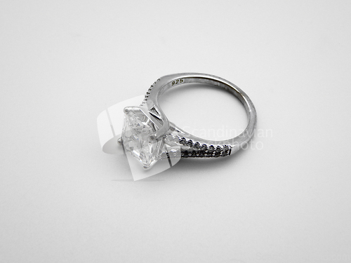 Image of Silver ring with a stone.