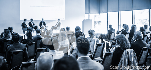 Image of Interview and round table discussion at business convention and presentation. Audience at the conference hall. Business and entrepreneurship symposium