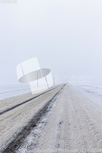 Image of dirty snow on the road