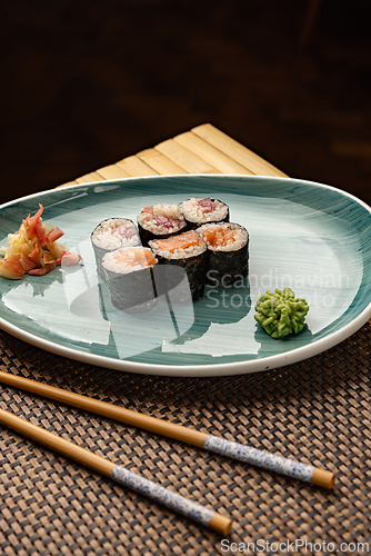 Image of Fresh hosomaki rolls, filled with salmon and tuna,