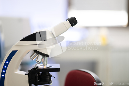 Image of Laboratory microscope on table in medical research facility