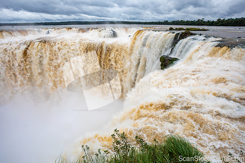 Image of Powerful Iguazu Falls, one of the world's most impressive waterfalls. Argentina side. Brazilian wilderness landscape.
