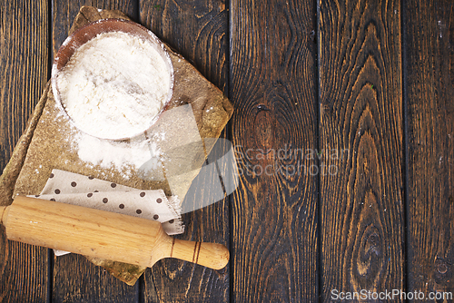 Image of Close up of bowl of flour on wooden table