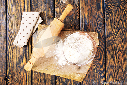 Image of Close up of bowl of flour on wooden table