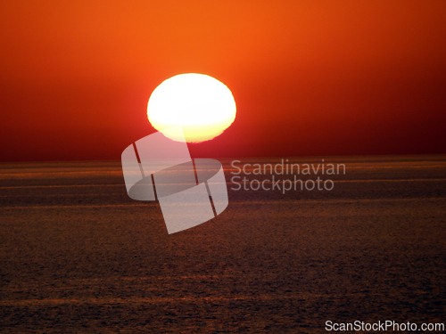 Image of Evening rocky shore of the Caspian Sea. Sunset.