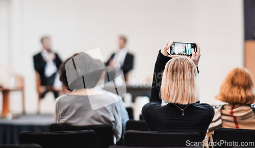Image of Interview and round table discussion at business convention and presentation. Audience at the conference hall. Business and entrepreneurship symposium