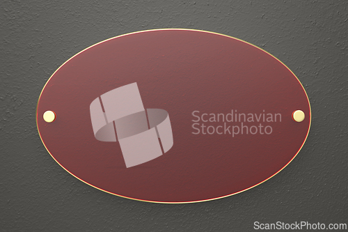 Image of Oval red glass nameplate with golden edge