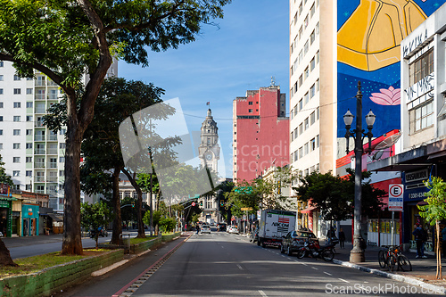 Image of Street view in Sao Paulo with a mix of modern and classic architecture, including the famous clock tower. Brazil