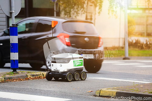 Image of Autonomous Food Delivery Robot Delivers Groceries