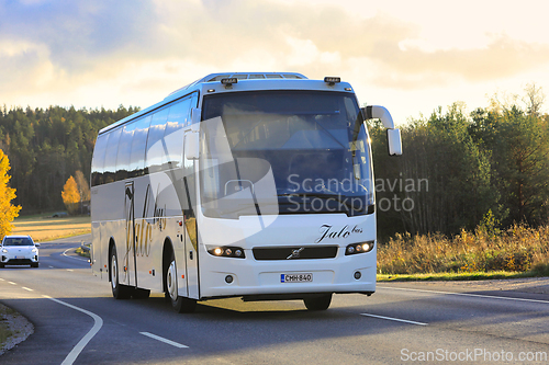 Image of White Volvo 9500 Coach Bus on Road