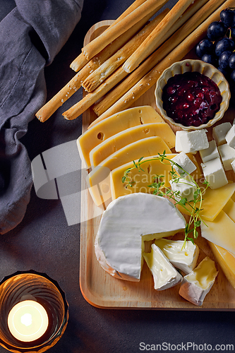 Image of cheese plate and bread sticks