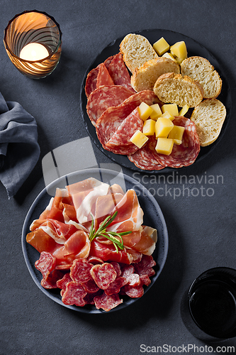 Image of meat and cheese plates