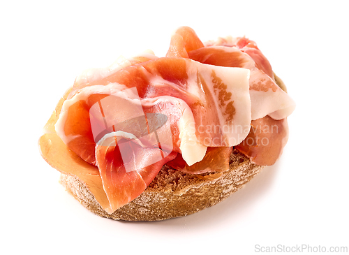 Image of bread slice with prosciutto