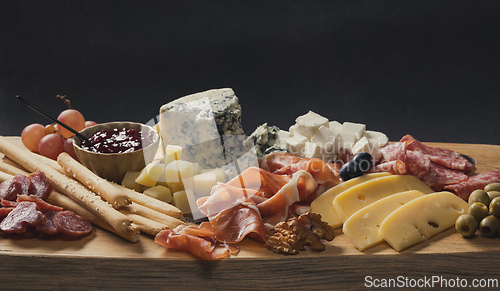 Image of set of various meat and cheese snacks