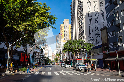 Image of Urban landscape of Sao Paulo, showcasing the contrast between the historical and contemporary buildings along a busy road. Brazil