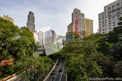 Image of Viaduto Nove de Julho and Rua Formosa, with buildings featuring murals, including one by artist Eduardo Kobra. Sao Paulo, Brazil