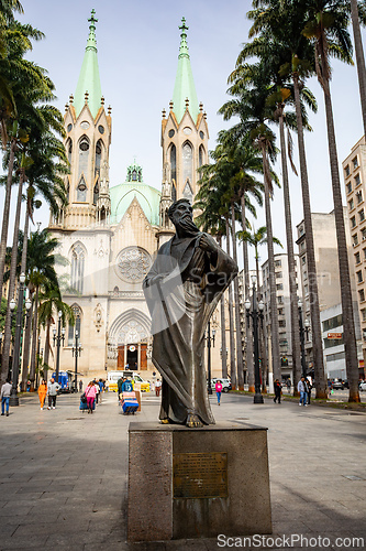 Image of Statue of Padre Jose de Anchieta with the Metropolitan Cathedral Our Lady of Consolation of Sao Paulo. Brazil