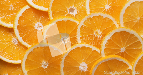 Image of closeup of ripe juicy orange fruit slices