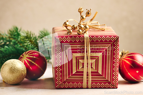 Image of beautiful Christmas Greeting card with wrapped gift box 