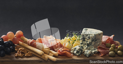 Image of set of various meat and cheese snacks