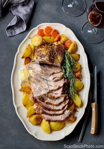 Image of freshly baked sliced pork neck roast
