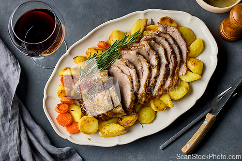Image of freshly baked sliced pork neck roast