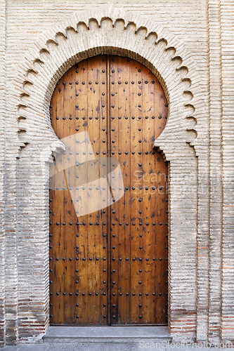 Image of Old wooden gate in Moorish style