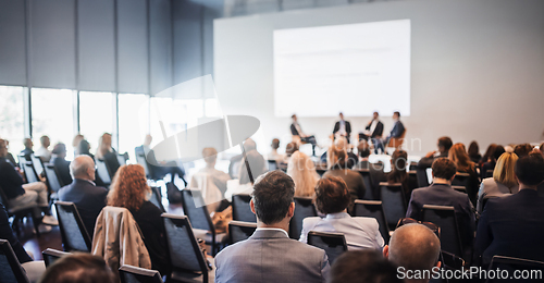 Image of Interview and round table discussion at business convention and presentation. Audience at the conference hall. Business and entrepreneurship symposium