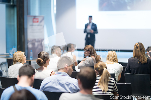 Image of Male business speaker giving a talk at business conference event.