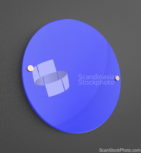 Image of Blue nameplate on dark grey wall