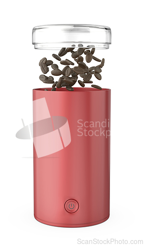 Image of Red electric coffee grinder with coffee beans