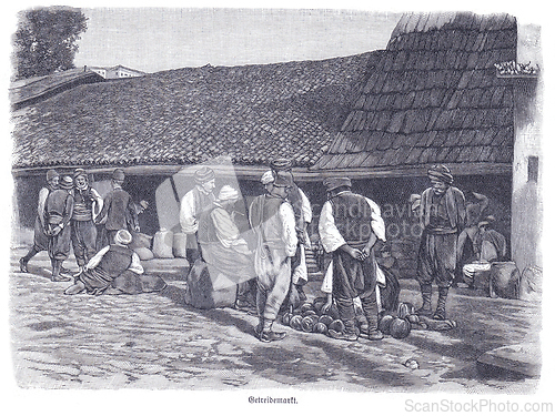 Image of An engraving depicting a lively historical marketplace scene with men in traditional attire gathered around sacks and produce, under a large-roofed building.