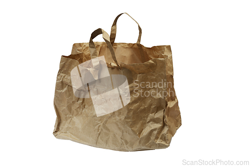 Image of crumpled paper bag with handles on a white background