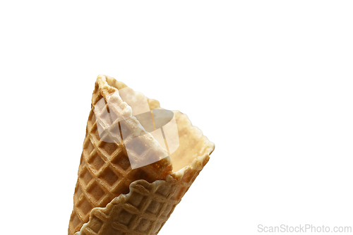 Image of An empty waffle cone on a white background