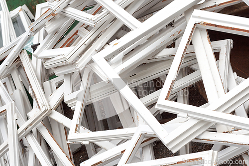 Image of Construction and reconstruction concept, replacing windows. Heap of old wooden window frames