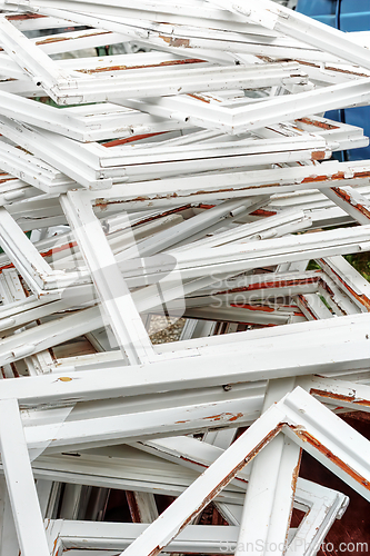 Image of Construction and reconstruction concept, replacing windows. Heap of old wooden window frames