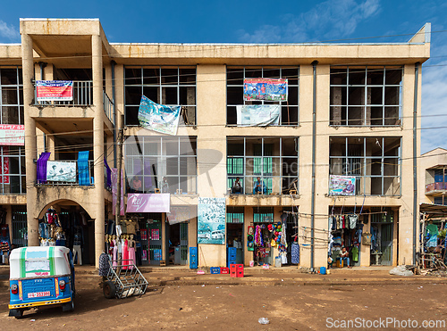 Image of Main retail hub of Demebecha, showing businesses operating on the ground floor. Ethiopia