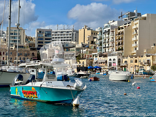 Image of Small fishing boats moored in St Julians and Spinola bay