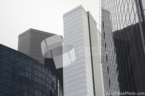 Image of modern office buildings against the backdrop of the northern lig