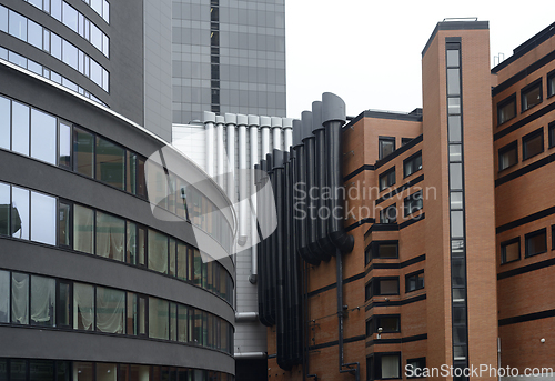 Image of modern architecture office buildings with ventilation pipes 