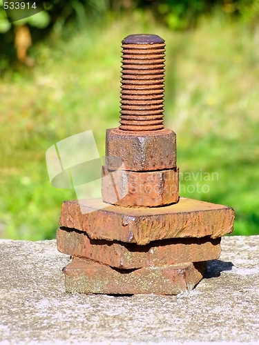 Image of rusty screw and nuts