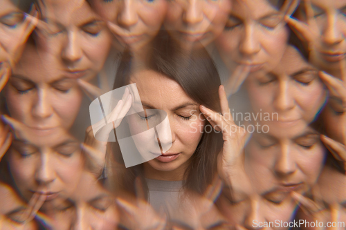 Image of Conceptual portrait of woman with headache, multiple overlay reflections surrounding face