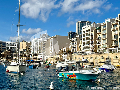 Image of Small fishing boats moored in St Julians and Spinola bay