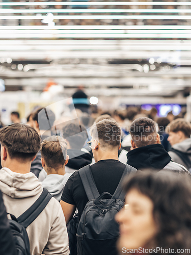 Image of Abstract blurred people at exhibition hall of expo event trade show. Business convention show or job fair. Business concept background.
