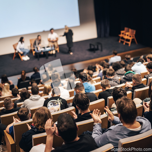 Image of Interview and round table discussion at business convention and presentation. Audience at the conference hall. Business and entrepreneurship symposium