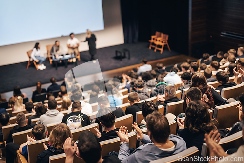 Image of Interview and round table discussion at business convention and presentation. Audience at the conference hall. Business and entrepreneurship symposium