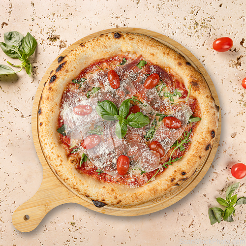 Image of Delicious pizza with parma ham