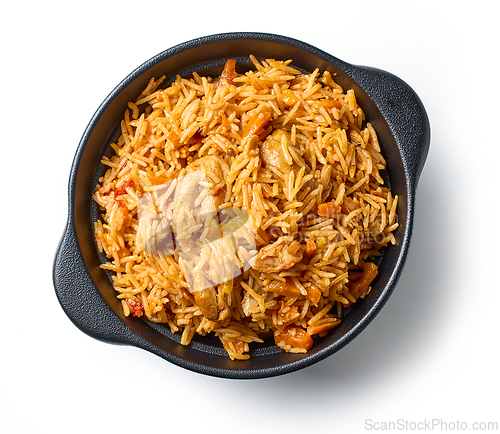 Image of bowl of spicy rice with chicken meat and carrots
