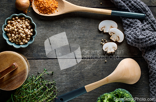 Image of cooking tools on wooden table
