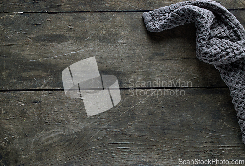 Image of old wooden table and towel